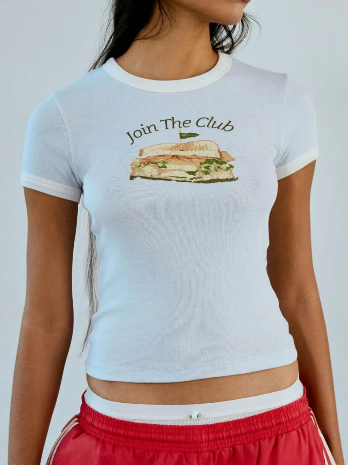 White and pale blue ringer tee with club sandwich print and “Join The Club” text across chest.