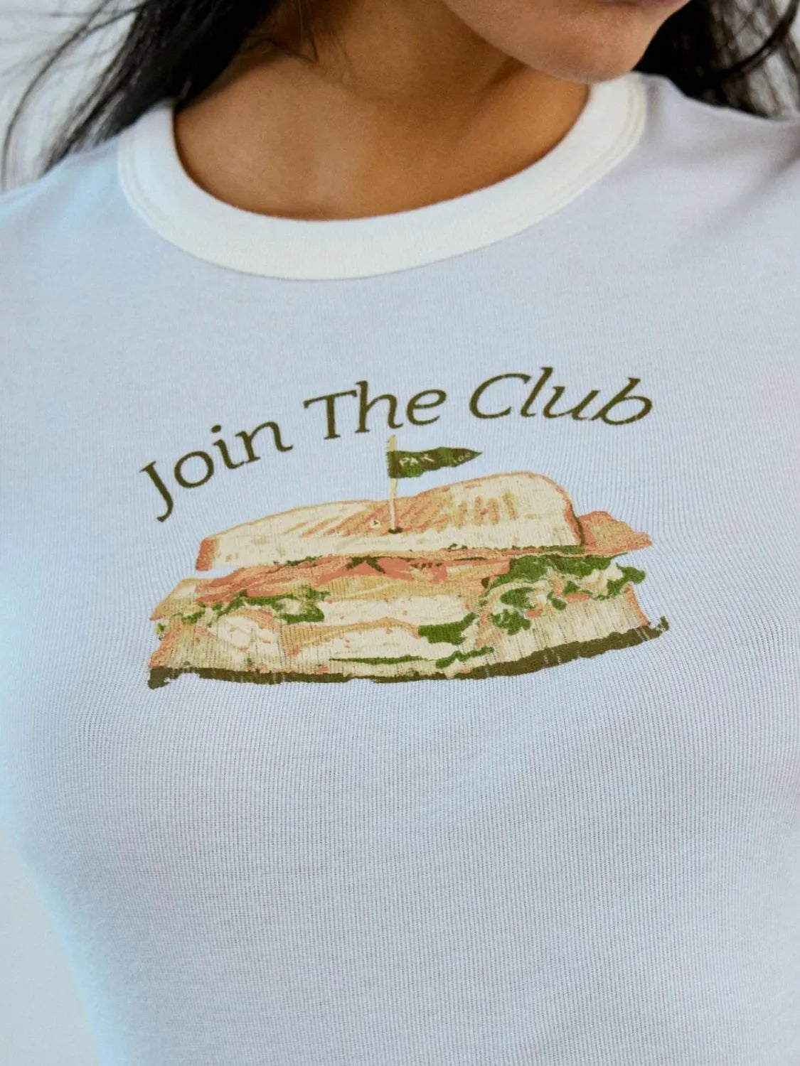White and pale blue ringer tee with club sandwich print and “Join The Club” text across chest.