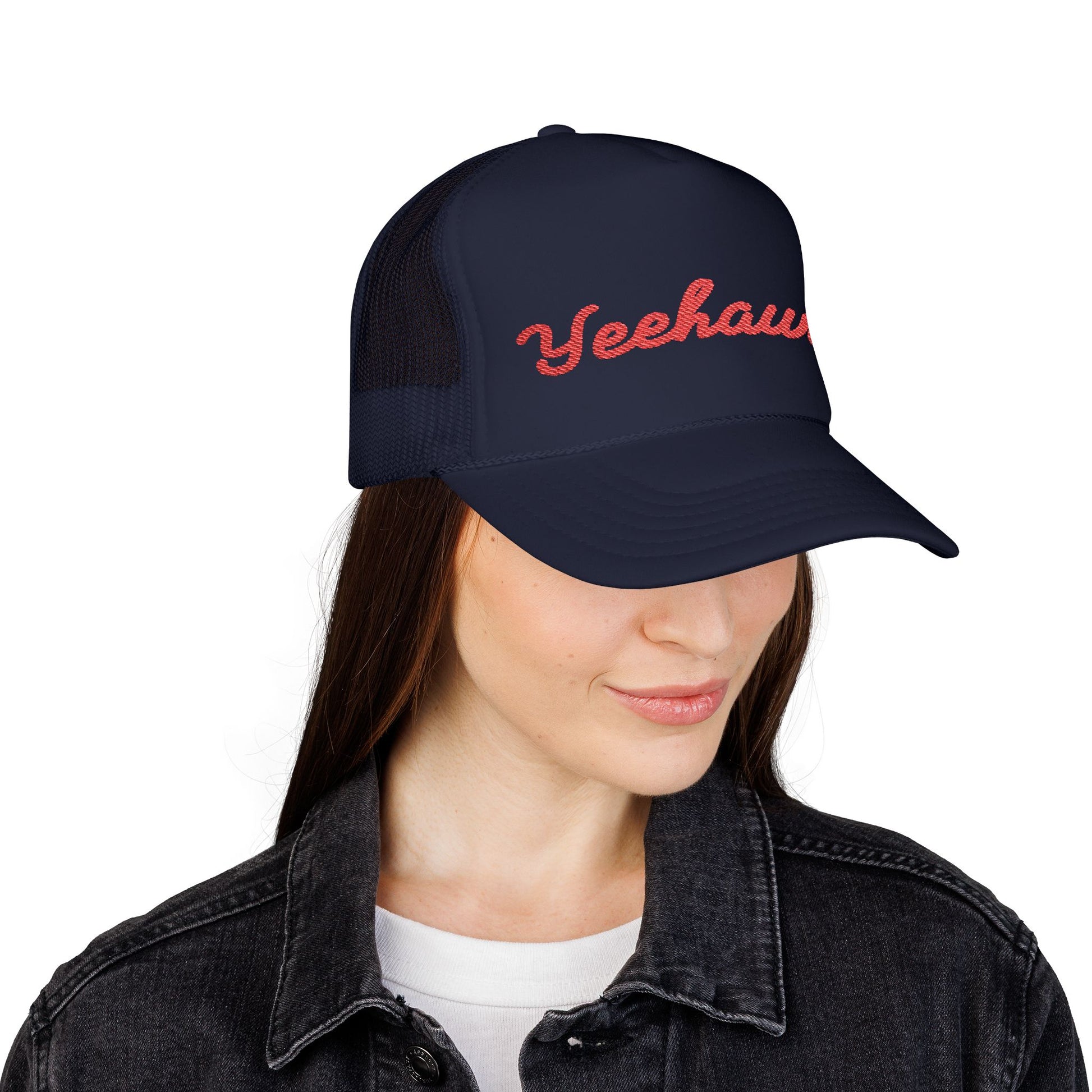 Modern western trucker hat with playful Yeehaw design on structured navy blue foam cap